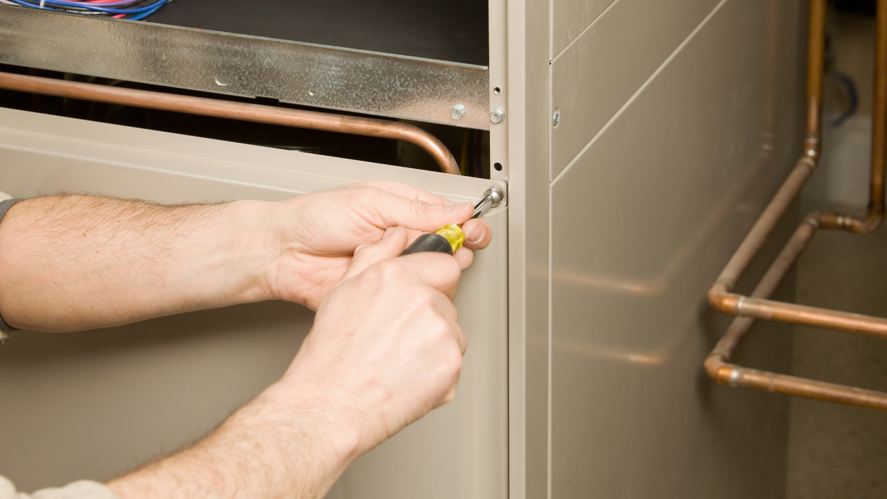 New furnace installation by Island Air Cooling technician
